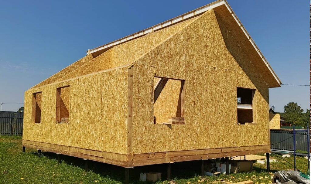 Фото 35 — Строительство дома из древесных панелей